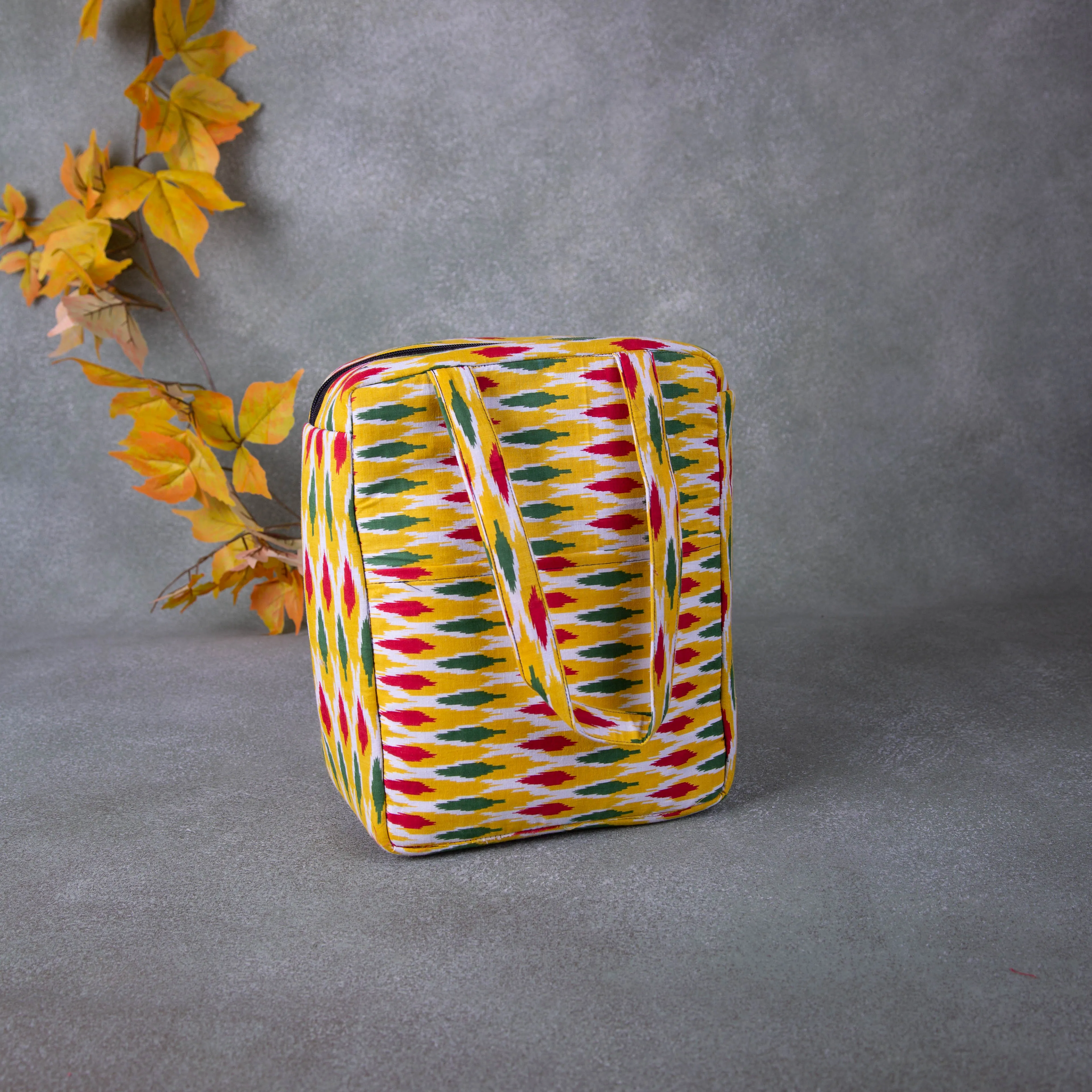 Water Proof Cotton Lunch Bag Yellow with Red and Green Ikat Prints.